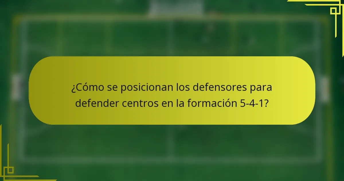 ¿Cómo se posicionan los defensores para defender centros en la formación 5-4-1?